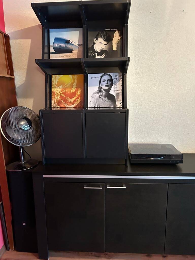 Ophon Coverfront record cabinet in birch plywood, black, two columns, two compartments high, with records standing cover-forward
