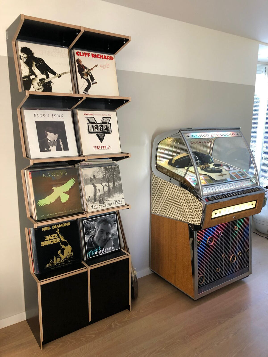 Two columns of four, next to the jukebox.