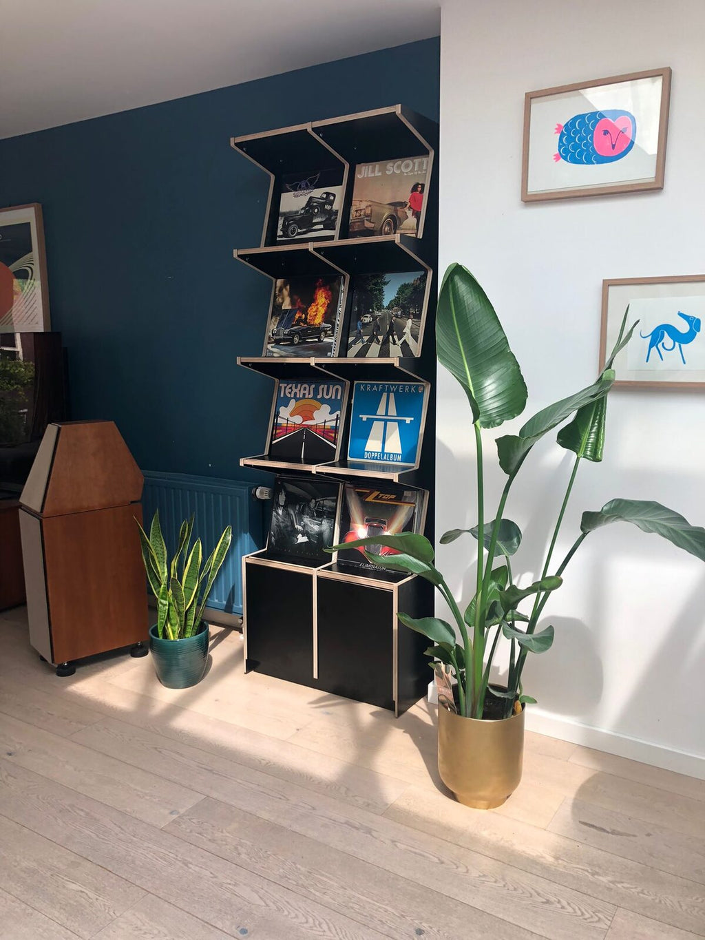 Ophon Coverfront record cabinet in birch plywood, black, two columns, four compartments high, with records standing cover-forward
