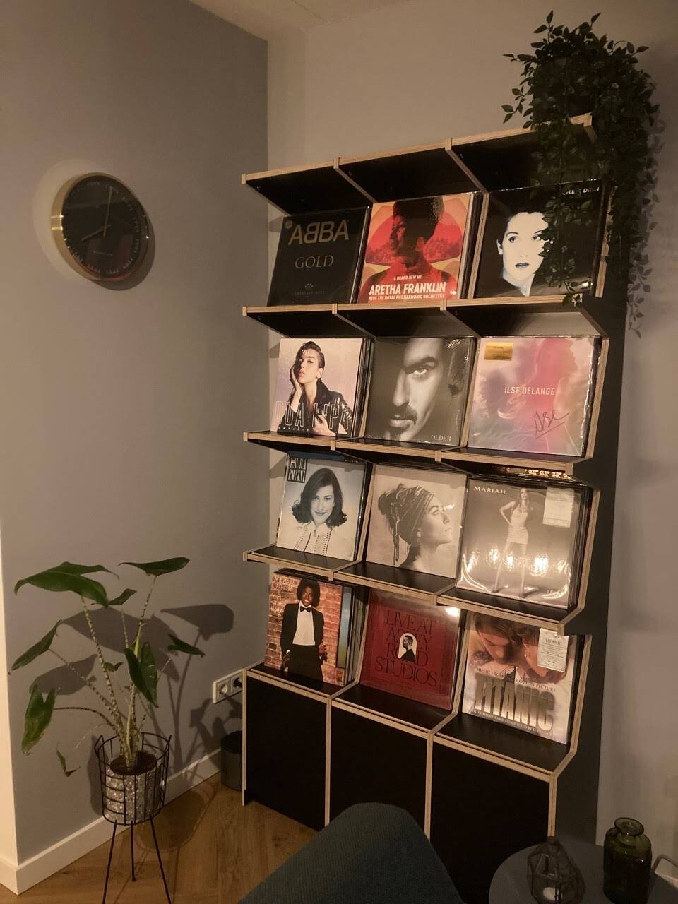 Ophon Coverfront record cabinet in birch plywood, black, three columns, four compartments high, with records standing cover-forward