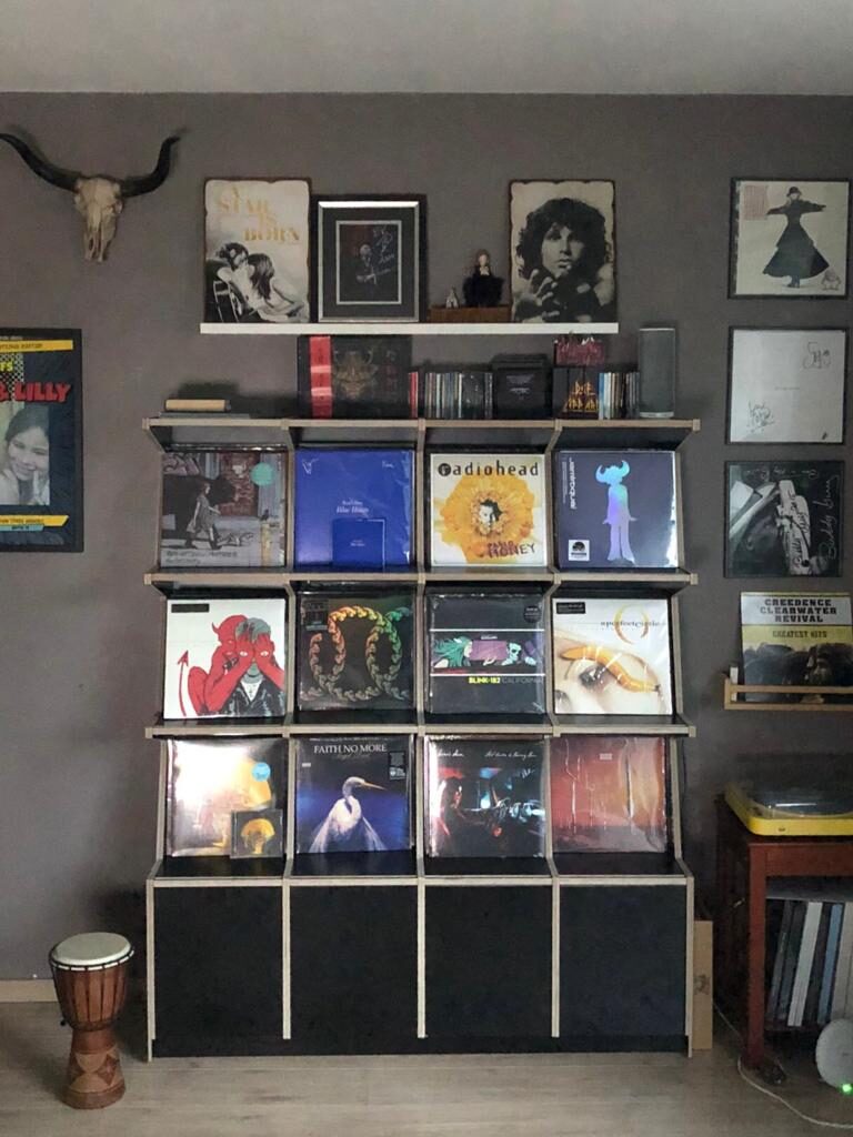 Ophon Coverfront record cabinet in birch plywood, black, four columns, three compartments high, with records standing cover-forward