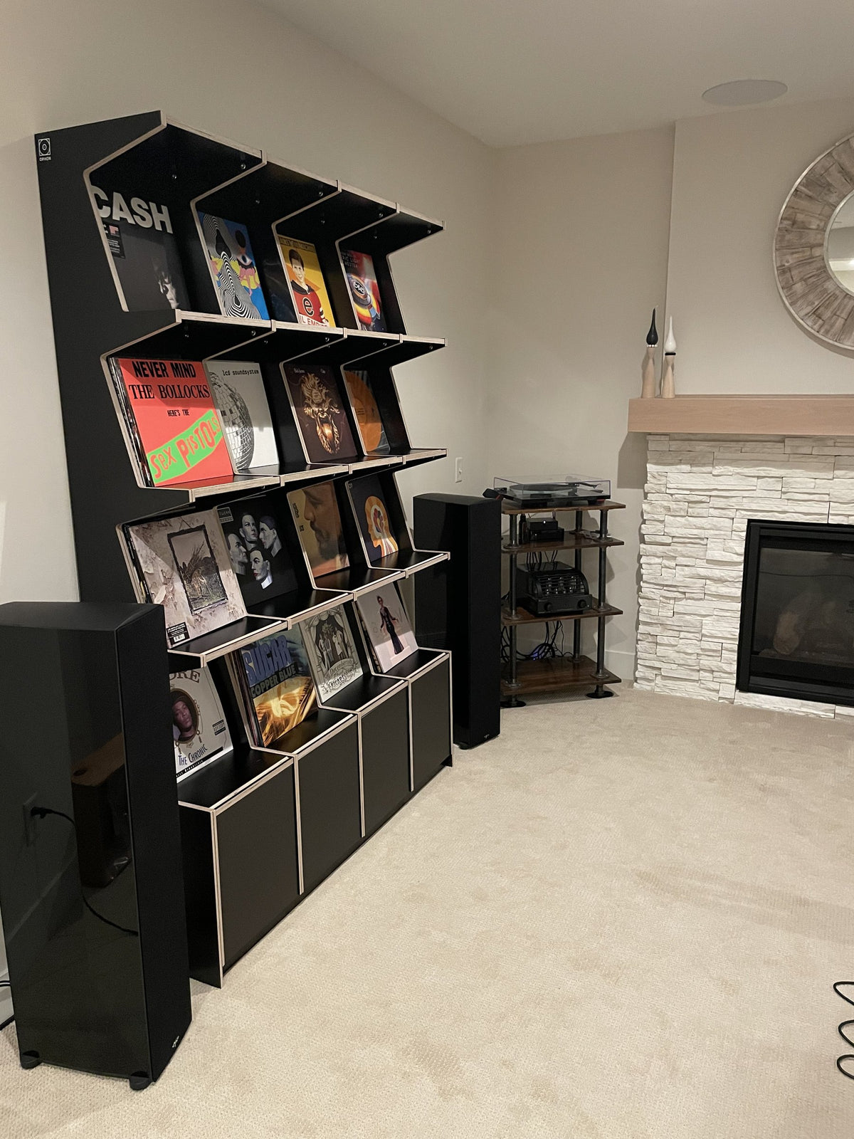 Black birch plywood record cabinet, 4 wide and 4 high, in a customer's home