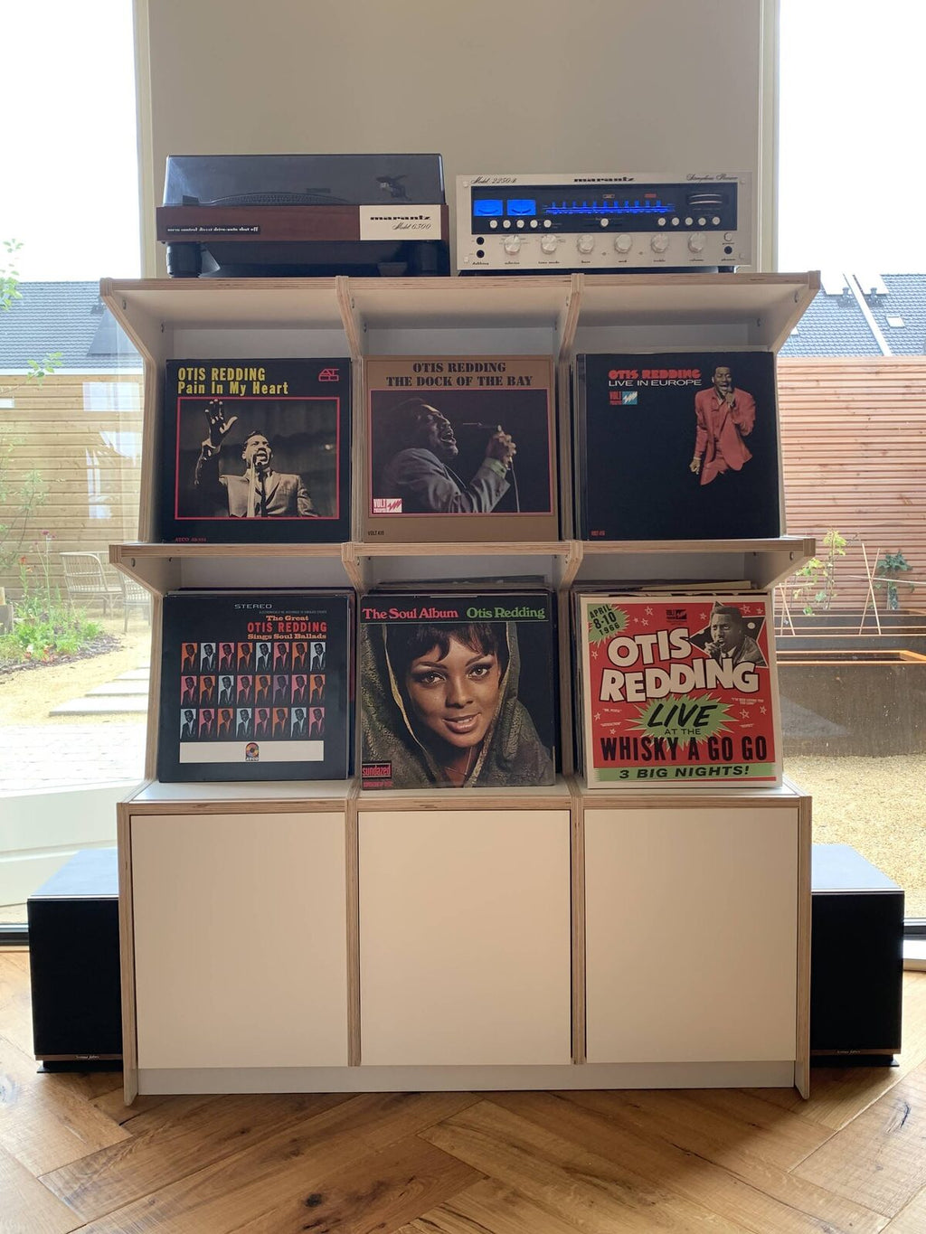 Ophon Coverfront record cabinet in birch plywood, white, three columns, two compartments high, with records standing cover-forward