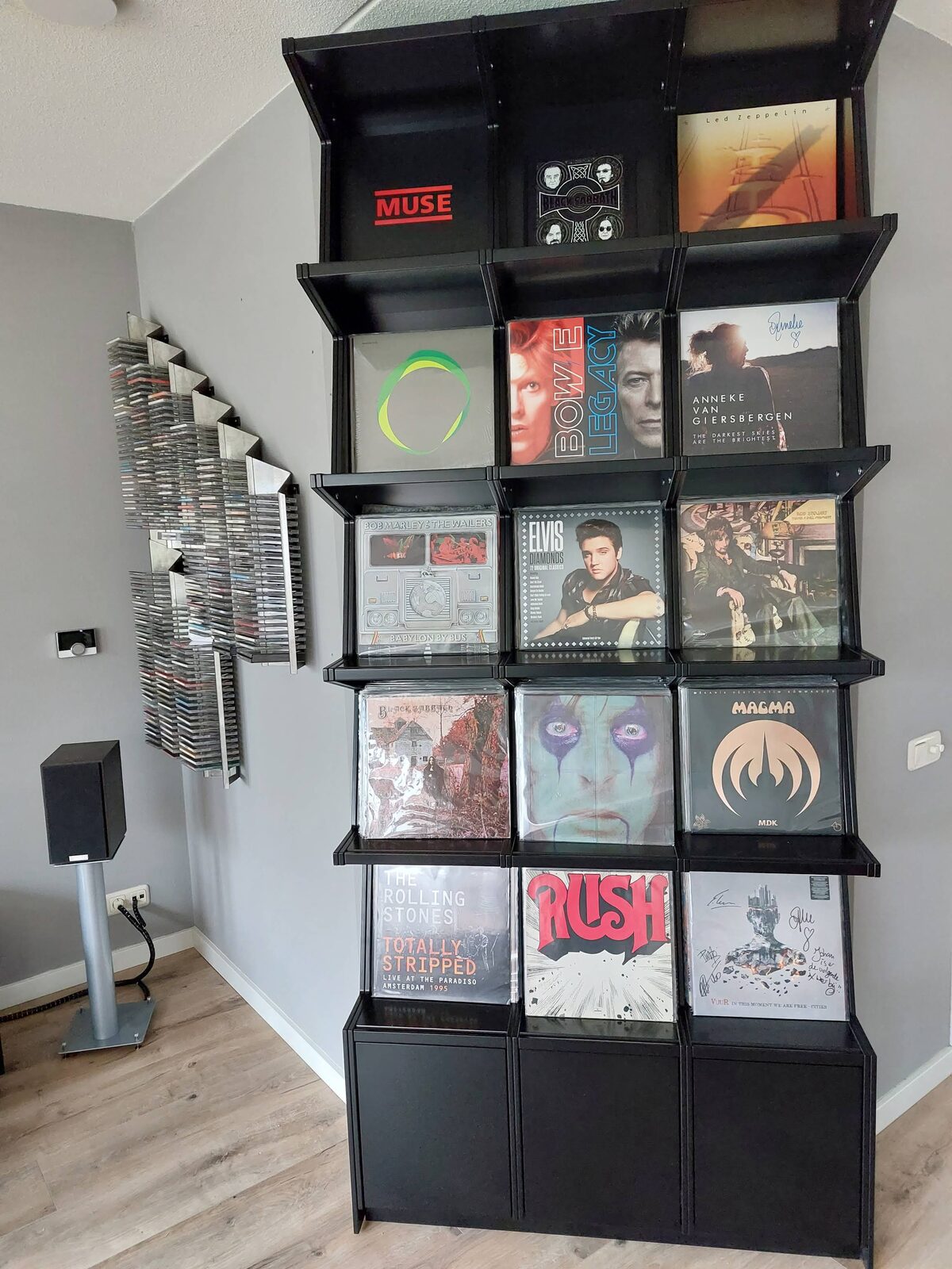 Ophon Coverfront record cabinet in sprayed MDF, a custom colour, three columns, five compartments high, with records standing cover-forward