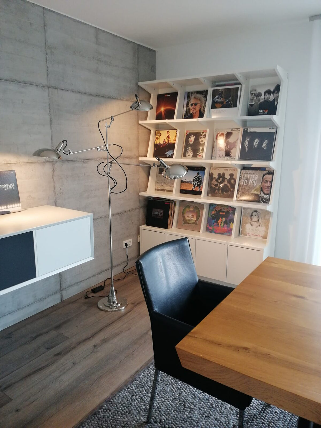 Ophon Coverfront record cabinet in sprayed MDF, white, four columns, four compartments high, with records standing cover-forward